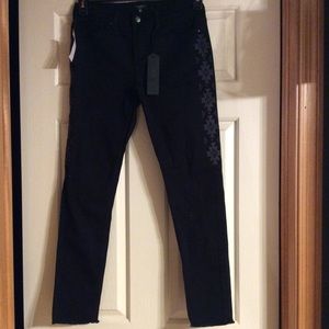 Women's black skinny jeans patterned size 5/6